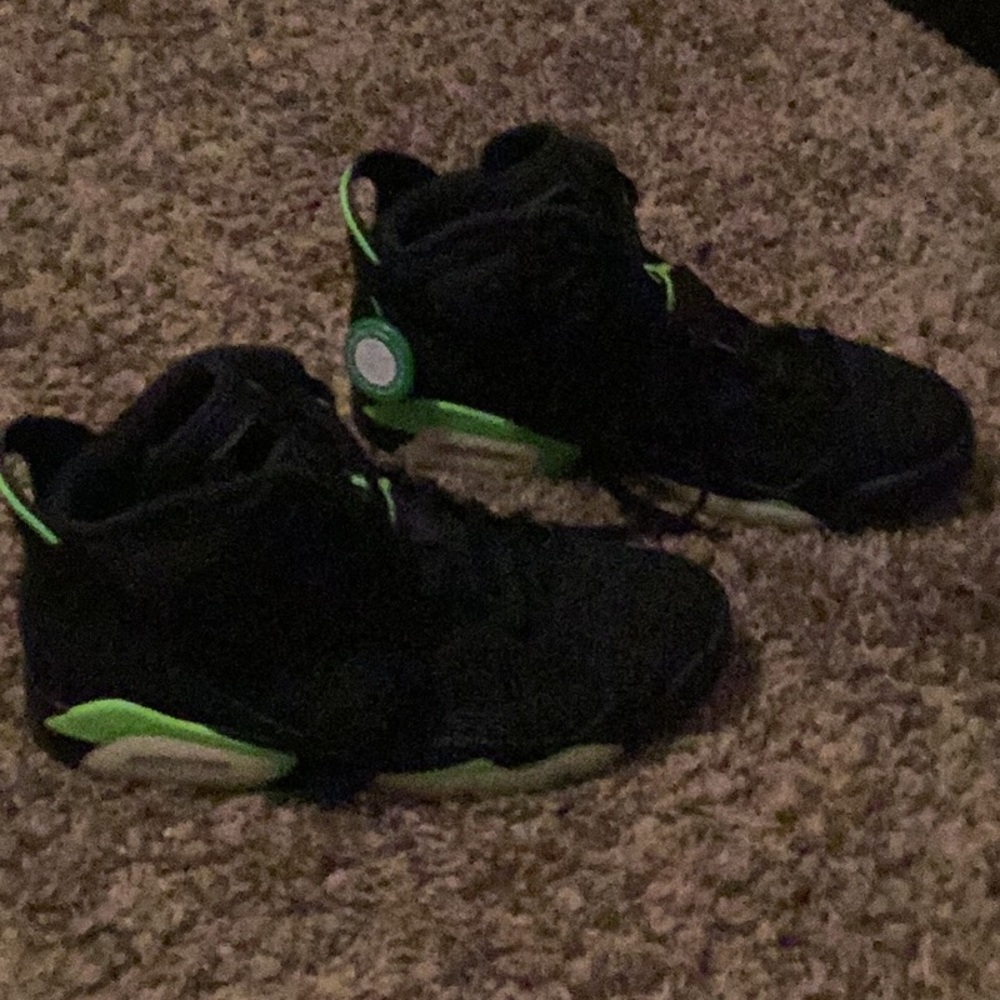 Green and black Jordan’s